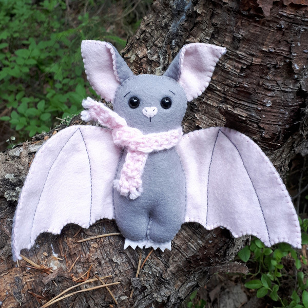 Cute-Bat-plush-in-the-woods