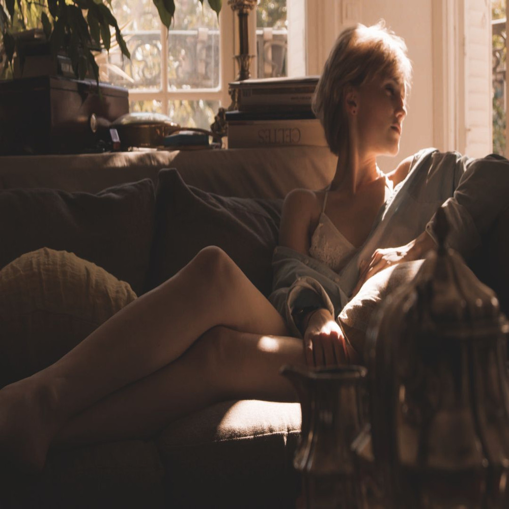 1080x1080 size woman-lying-down-on-a-couch-relaxing.00_00_18_04.Quadro002-1594x1062.jpg