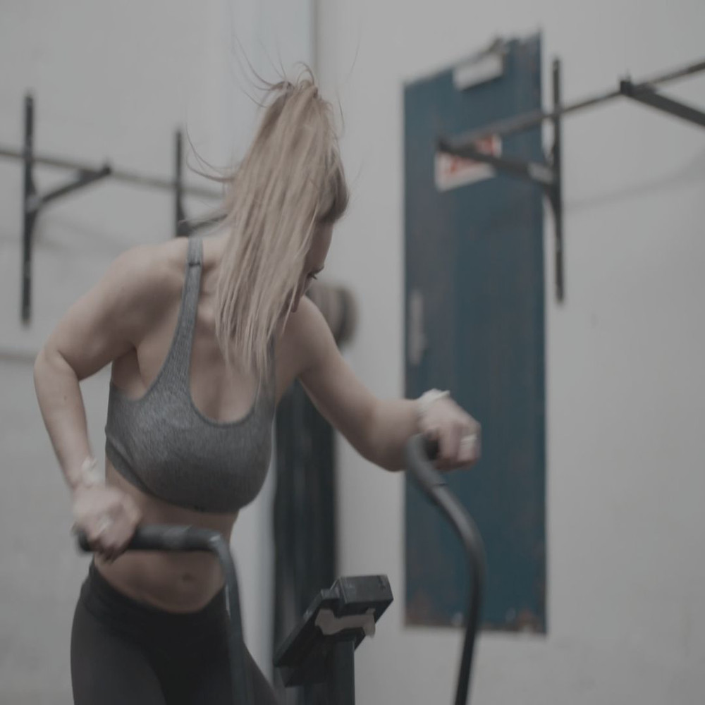 1080x1080 size woman-on-an-exercise-bike-at-the-gym.00_00_04_00.Quadro002-1594x1062.jpg