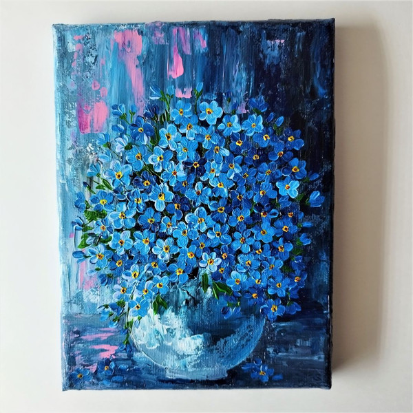 Palette-knife-painting-blue-flowers-forget-me-nots-on-stretch-canvas-acrylic-paints.jpg