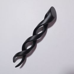 Black spiral hair fork made of stabilized hornbeam.