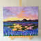 Landscape-painting-orange-sunset-hills-violet-wildflowers-on-the-lake-shore-on-stretch-canvas-acrylic-paints.jpg