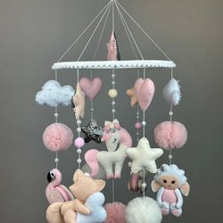 Unicorn baby mobile in a cribe. Baby mobile for girl. Unicorn mobile