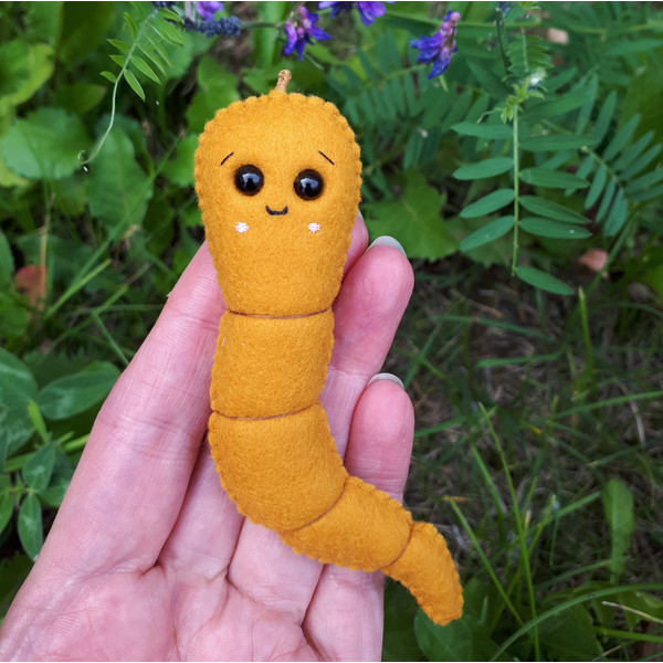 Worm-plush-in-a-hand