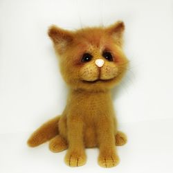 Stuffed ginger realistic cat