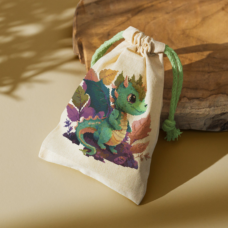 5 Emerald baby dragon symbol of 2024 cross stitch pattern.jpg