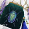 blue scarab bead embroidery emerald velvet bag.jpg