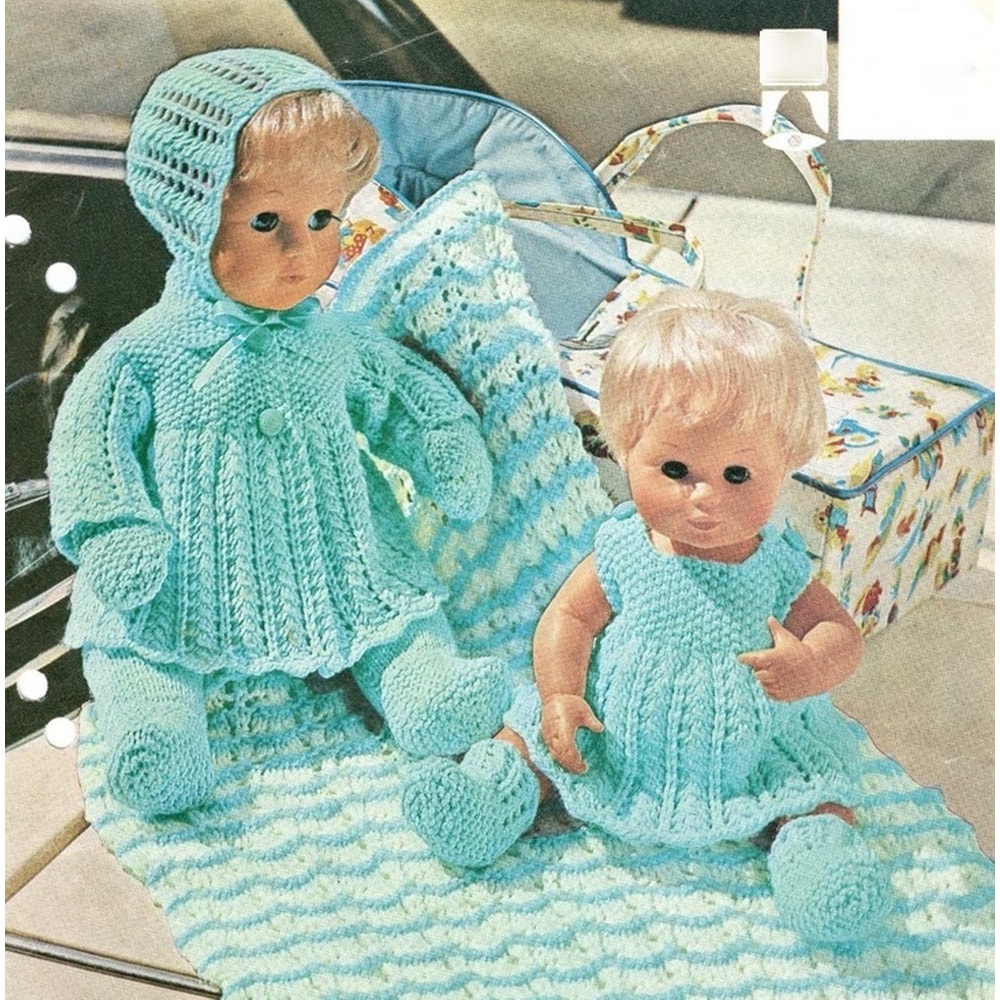 8-Piece Baby Doll Wardrobe Clothes Knitting Pattern.jpg