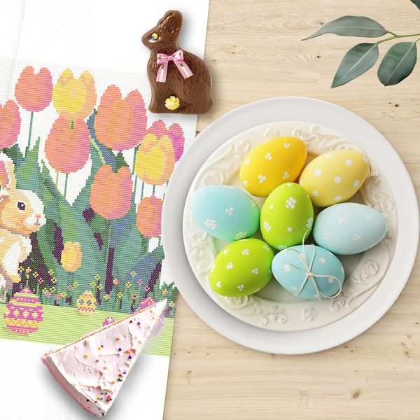 5 Cute Easter bunny in the spring green garden with red yellow pink tulips and multicolored Easter eggs and flowers cross stitch PDF pattern created for Creativ
