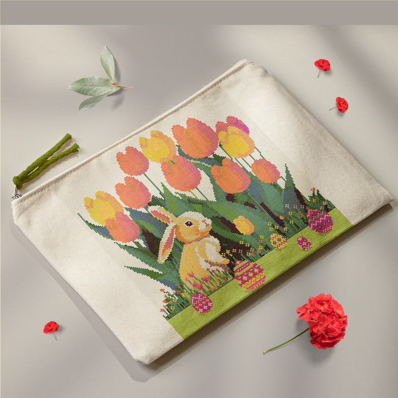 6 Cute Easter bunny in the spring green garden with red yellow pink tulips and multicolored Easter eggs and flowers cross stitch PDF pattern created for Creativ