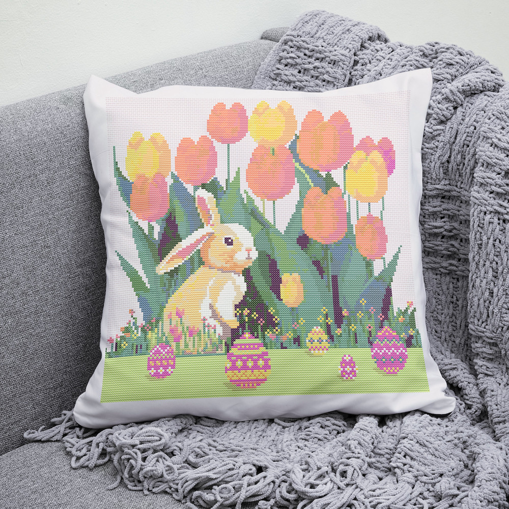 9 Cute Easter bunny in the spring green garden with red yellow pink tulips and multicolored Easter eggs and flowers cross stitch PDF pattern created for Creativ