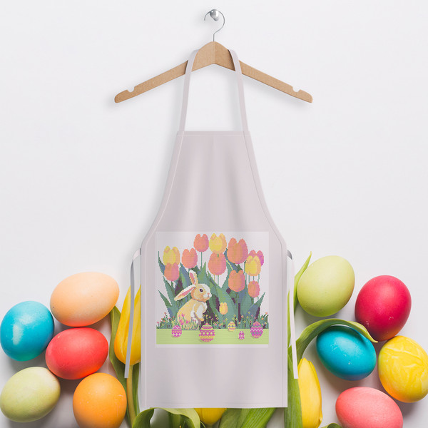 13Cute Easter bunny in the spring green garden with red yellow pink tulips and multicolored Easter eggs and flowers cross stitch PDF pattern created for Creativ