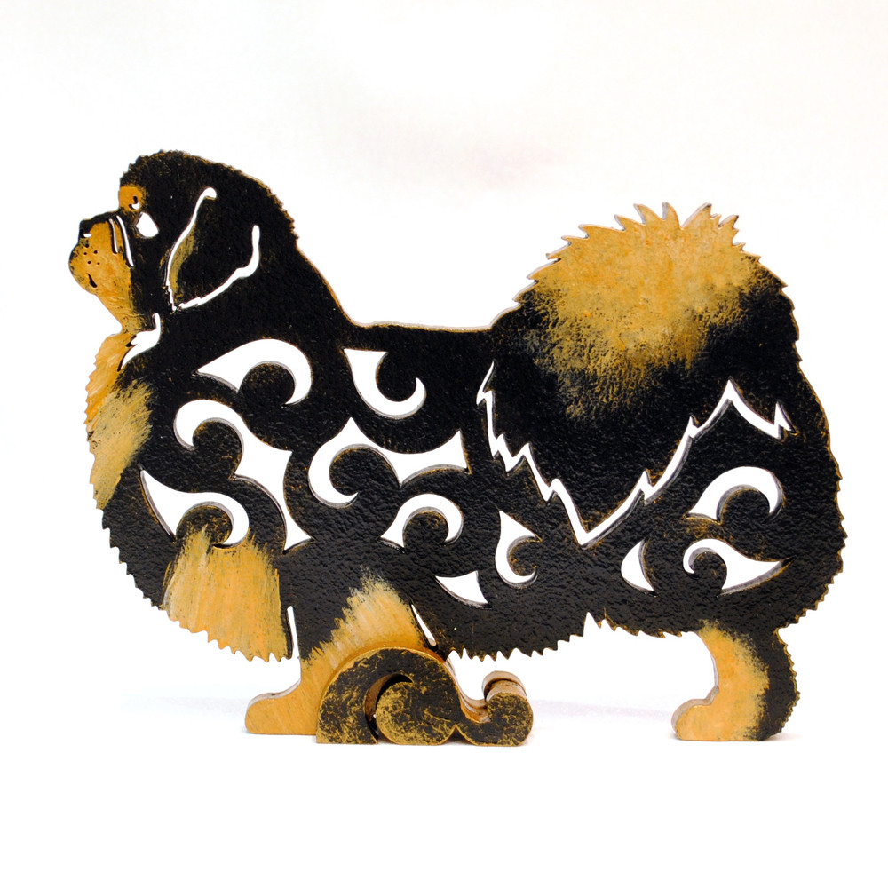 Figurine black and tan Tibetan Spaniel of wood