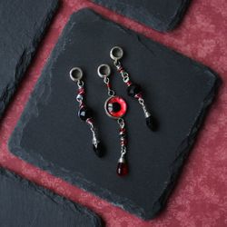 set of 3 loc beads, black and red dread beads with eye and glass drops