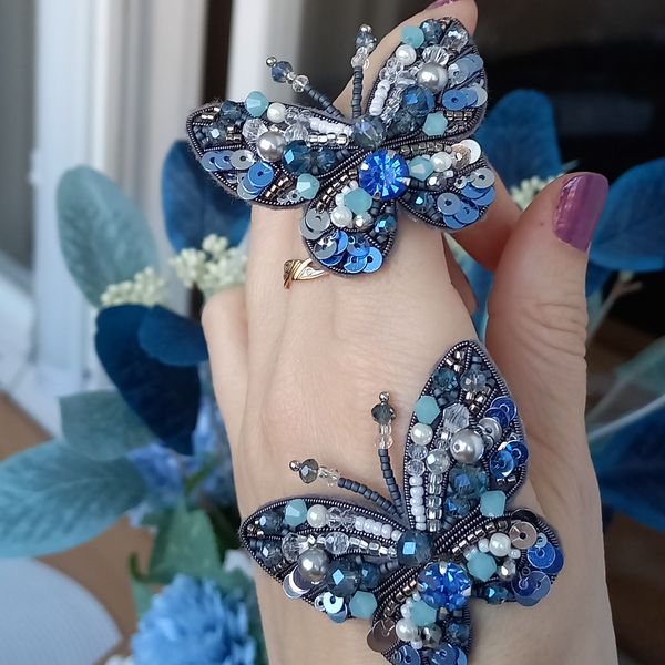 butterflies, brooches on hand