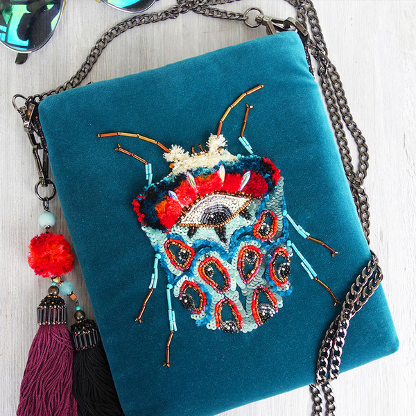 evil eye turquoise beetle bead embroidery velvet crossbody in boho style.jpg