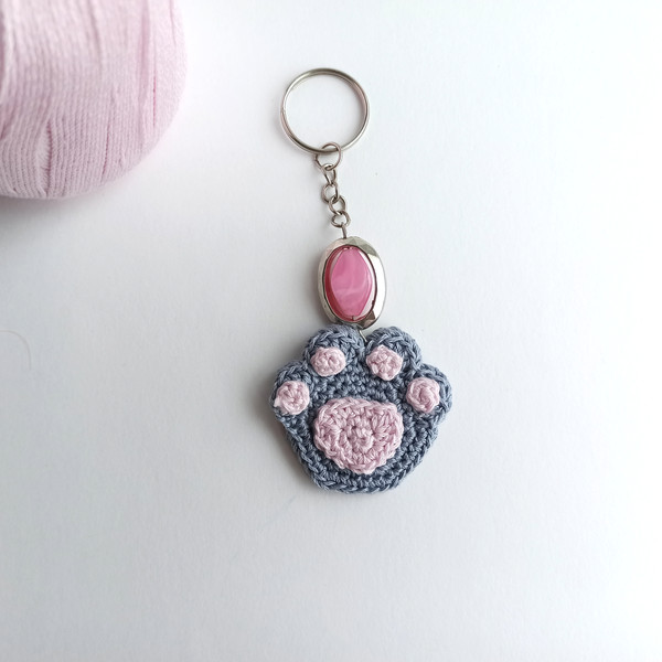 Crochet_Cat_Paw_on_a_White_Background_with_a_Pink_Keychain_6.jpg