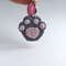 Crochet_Cat_Paw_on_a_White_Background_with_a_Pink_Keychain_4.jpg