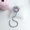 Crochet_Cat_Paw_Bookmark_on_a_White_Background_2.jpg