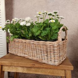 Wicker flower basket. Beige rectangular handmade basket