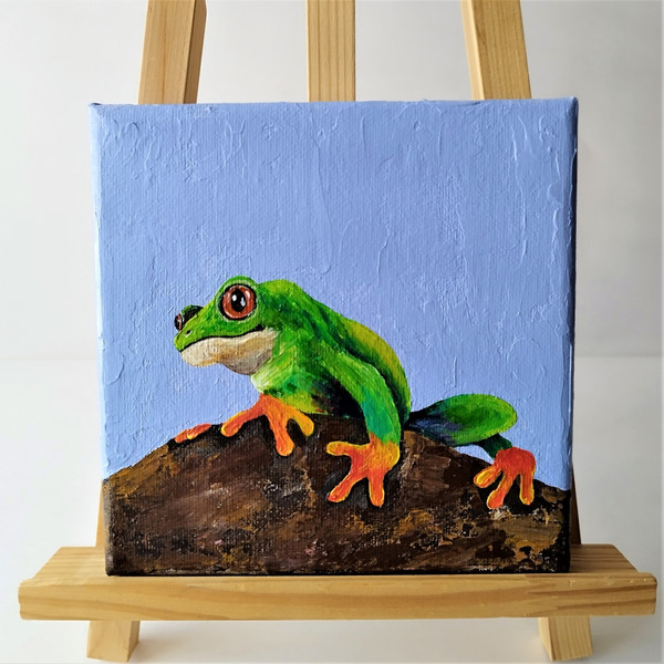 Bright-frog-painting-on-canvas-with-acrylic-paints-wall-decor.jpg