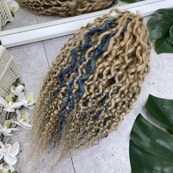 curled dreadlocks with bright strands