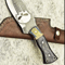 Skull Engraved Bowie Knife.png
