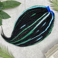 very soft dreadlocks with turquoise embellishments