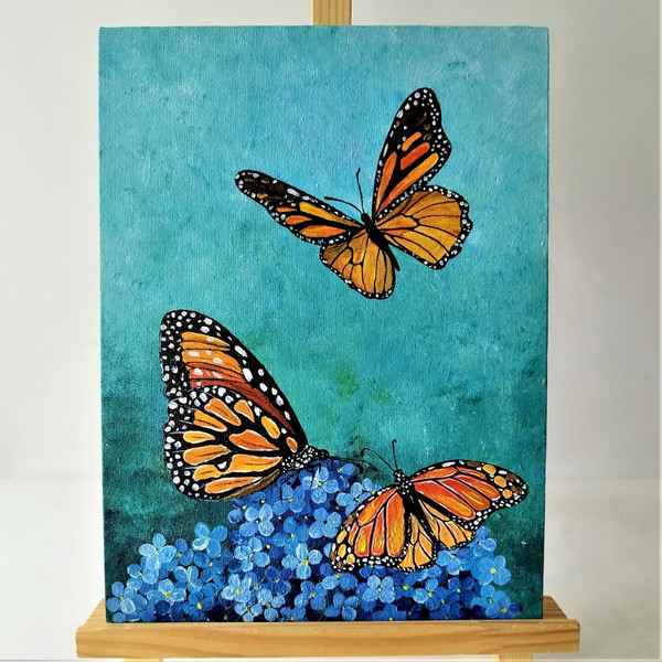 Bright-painting-flower-blue-hydrangea-with-monarch-butterflies-acrylic-painting.jpg