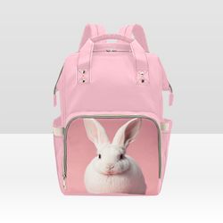 white rabbit on pink diaper bag backpack