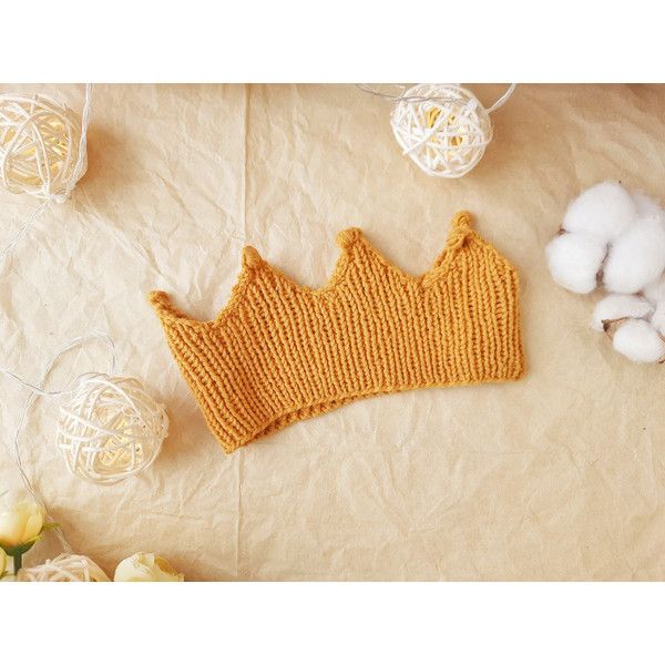 mustard knitted headband crown on the baby's head..jpg