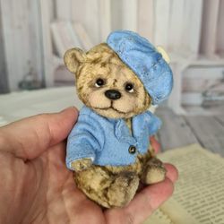 Miniature teddy bear. Mini bear. Collectible toy.