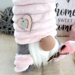 Pink plush gnome stuffed doll with bird