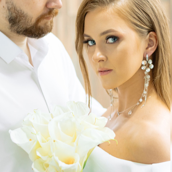 Long earrings, on the bride