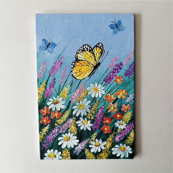 Small-painting-yellow-butterfly-and-wildflowers-in-impasto-style-wall-decoration.jpg