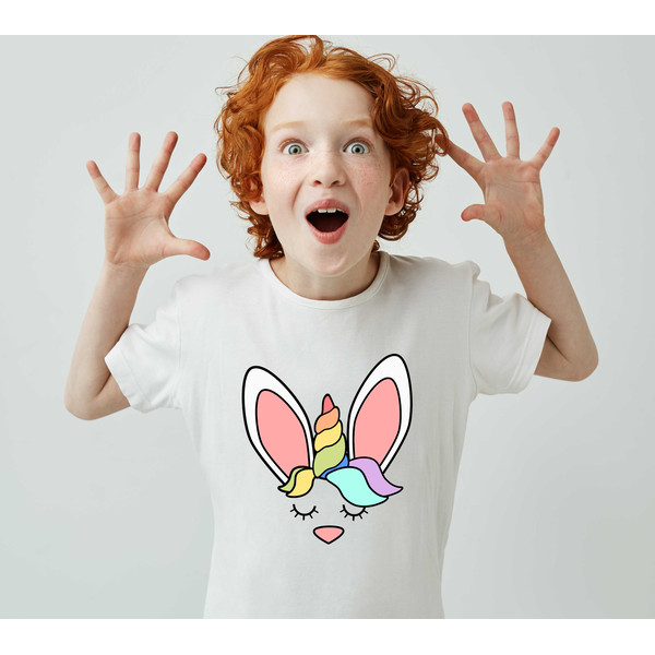 little-cute-boy-with-ginger-hair-white-t-shirt-having-fun-home-popping-eyes-with-opened-mouth.jpg