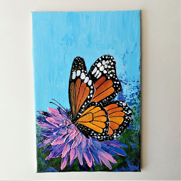 Insect-butterfly-monarch-on-a-pink-aster-flower-acrylic-painting.jpg