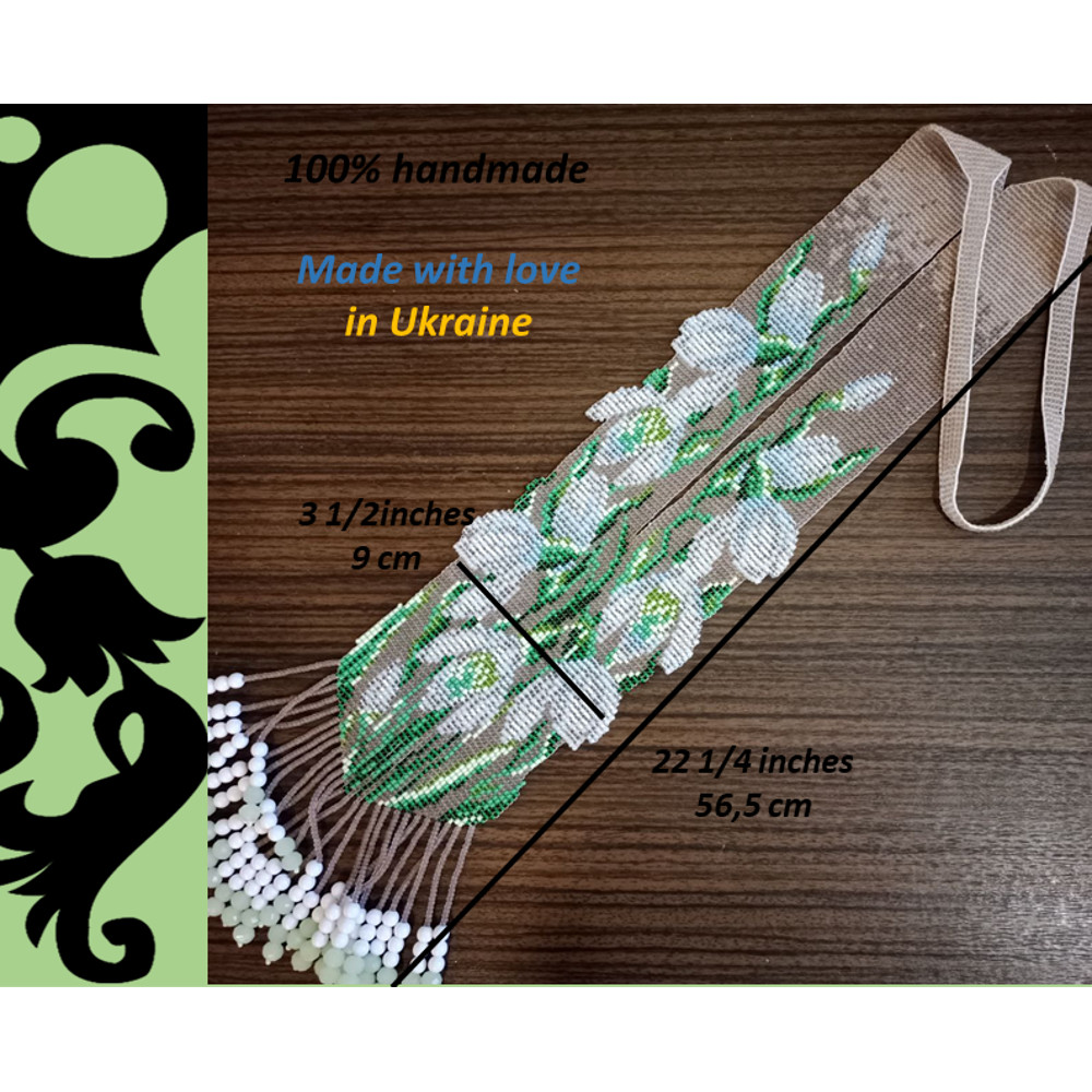 Long beaded necklace.png