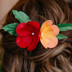 orange red plumeria flower hair comb, tropical headpiece, hawaiian hair clip, tiki hair flower realistic.