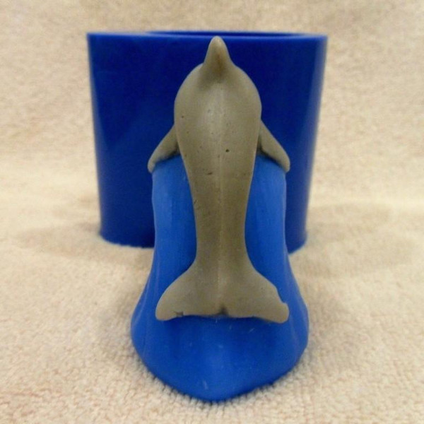 Dolphin on a wave soap back