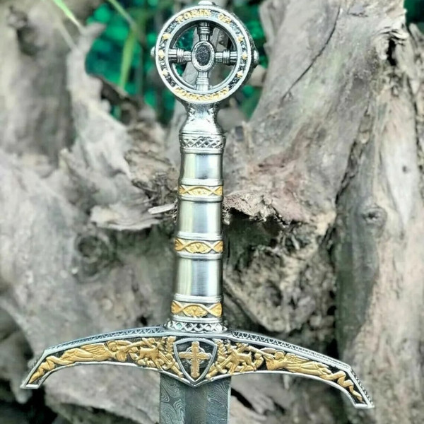 Damascus Steel Viking Sword with metal handles.jpeg