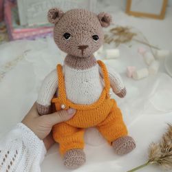 Spring teddy bear knitting pattern. Stuffed knitted doll
