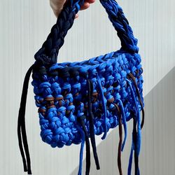 crocheted baguette bag with metal clasp
