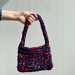 crocheted mini baguette bag with metal button clasp