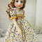 Little Darling floral print smocked dress with yellow trim right.jpg