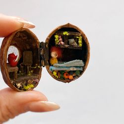 Tiny fairy garden house. Walnut shell diorama with tiny doll. Dollhouse miniatures.