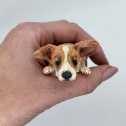 Corgi. Miniature little crocheted corgi. Cute dog. Amigurumi puppy. Funny pet. A fat dog. A puppy as a souvenir