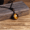 tigereyeronicnecklace4.png
