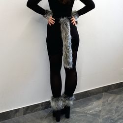 Wolf tail made of faux fur for a party, festival, cosplay, masquerade. Gray, black, beige fluffy tail for fancy dress.