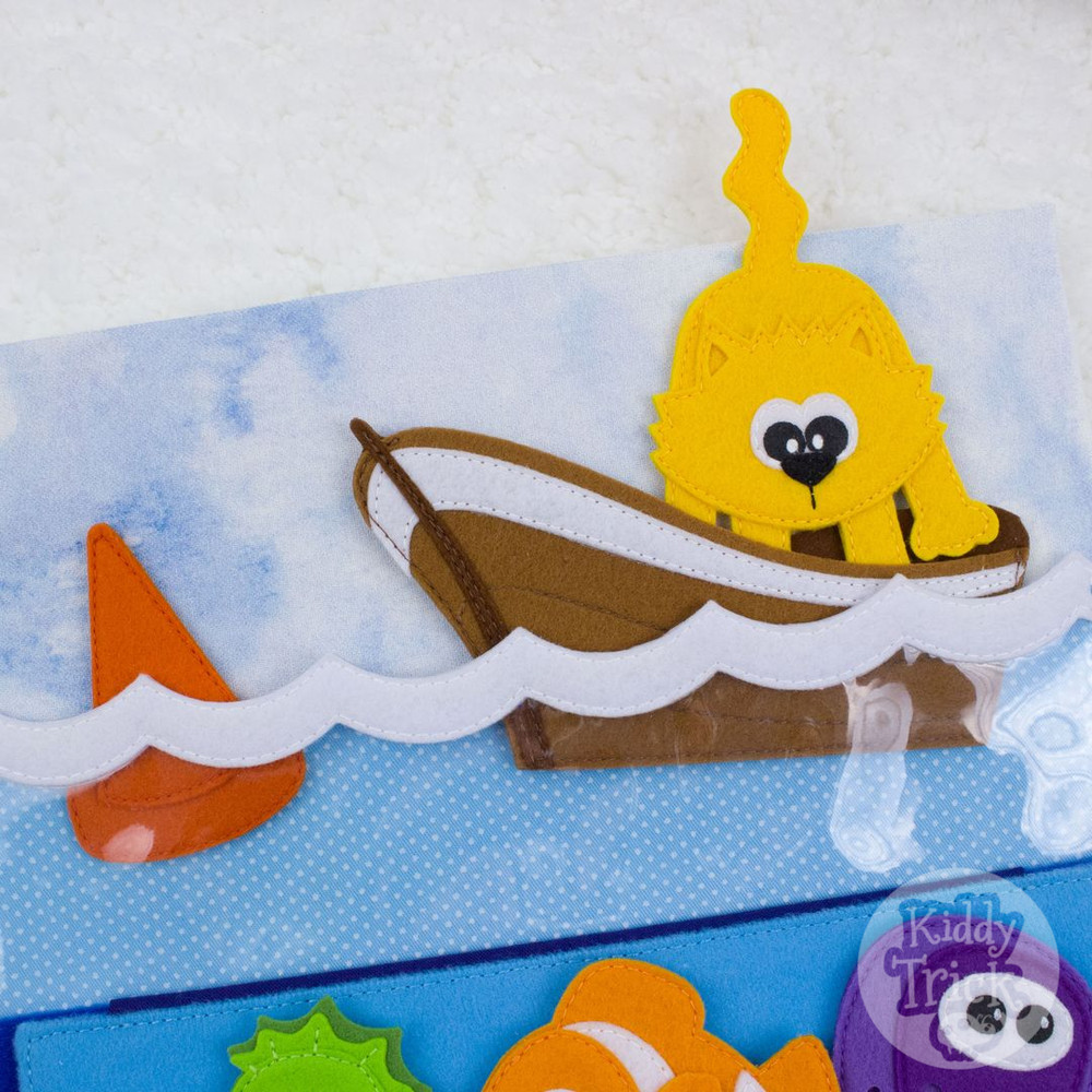 felt cat in a boat